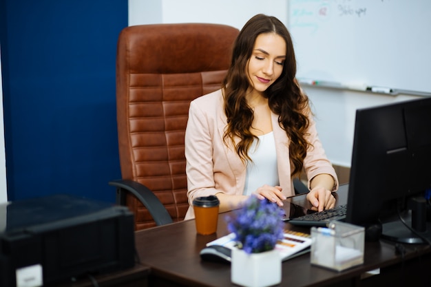 businesswoman at her desk in the office