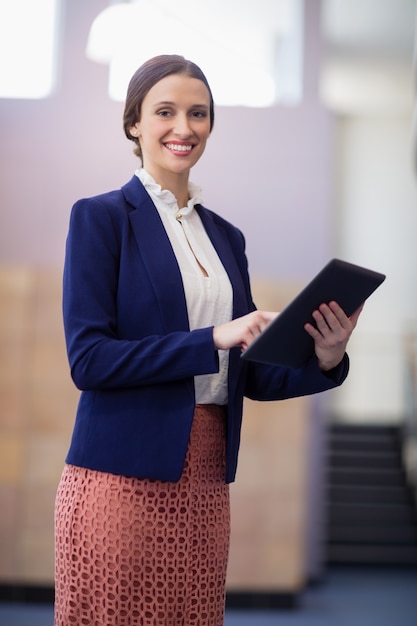 Businesswoman holding digital tablet