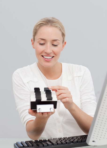 Businesswoman holding an index holder