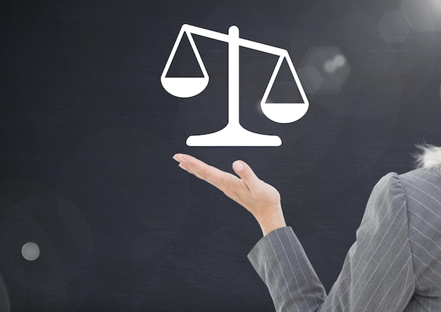businesswoman holding justice icon