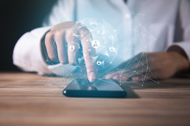 Businesswoman holding phone with social media network icons structure