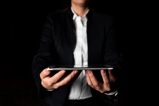 Businesswoman Holding Tablet And Presenting Important Informations Woman Showing Recent Updates On Screen Executive Displaying Late Achievements On Cellphone