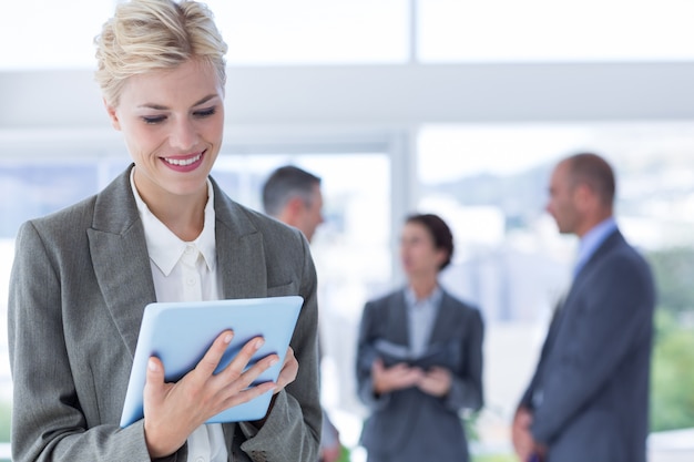 businesswoman holding tablet 