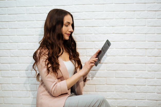 Businesswoman holding tablet