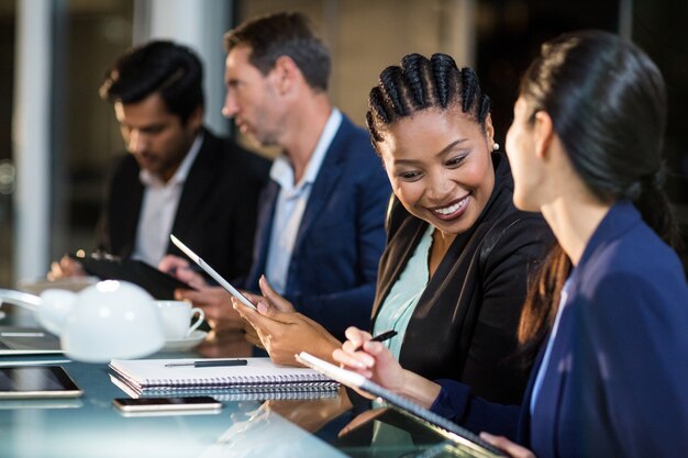 Businesswoman interacting with a colleague