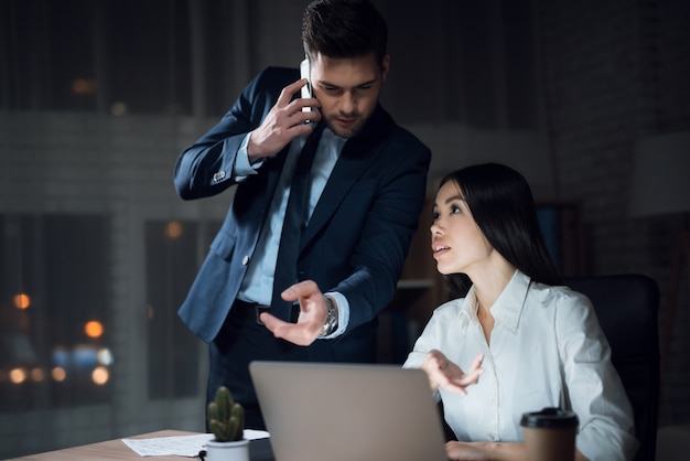 Businesswoman is Working in Office at Night