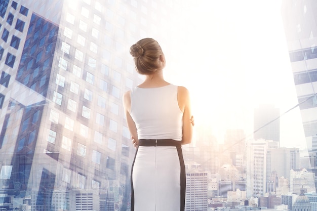 Businesswoman looking at city