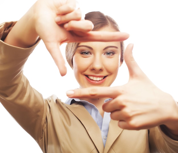 Businesswoman make frame with fingers