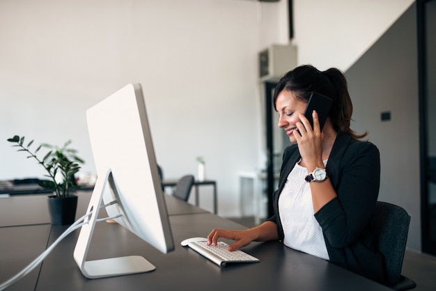 Businesswoman in modern office.