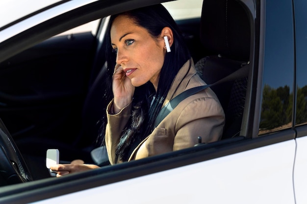 Businesswoman on the Move Renting a Luxury Car for Meetings