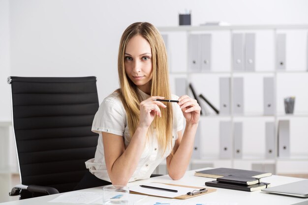 Businesswoman at office desk