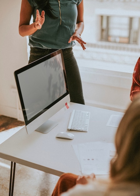Businesswoman pitching in her idea in a meeting