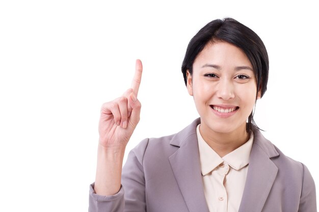 Businesswoman pointing up one finger gesture