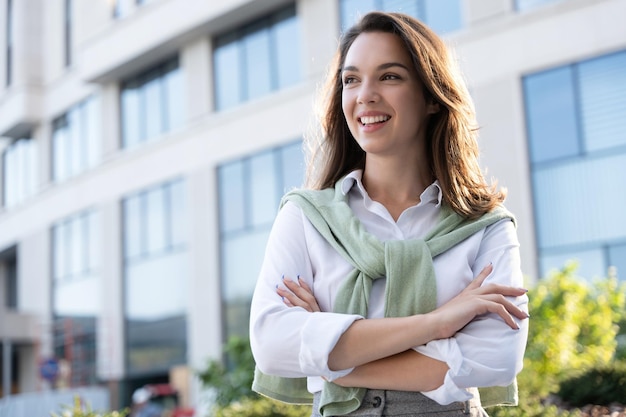 Businesswoman portrait Caucasian female business person standing outdoor looking at camera