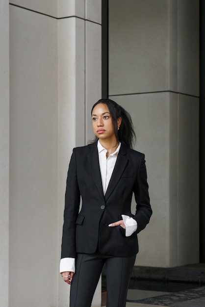 Businesswoman posing outdoors