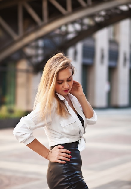 Businesswoman posing outdoors