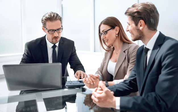 Businesswoman presenting to colleagues at a meeting