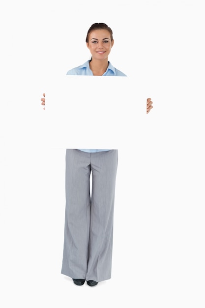 Photo businesswoman presenting sign