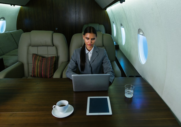 Businesswoman on private jet