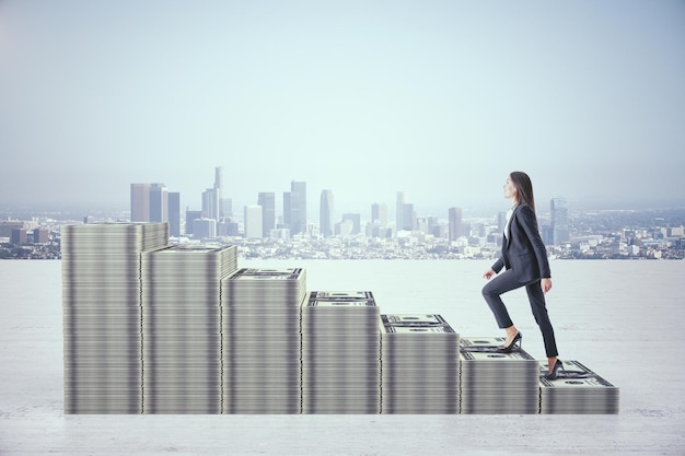 Businesswoman rises in stacks of dollars money in form chart on city background