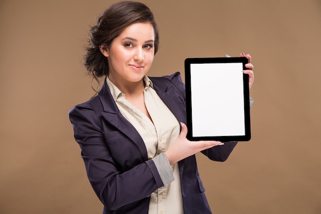 Businesswoman or saleswoman with the tablet