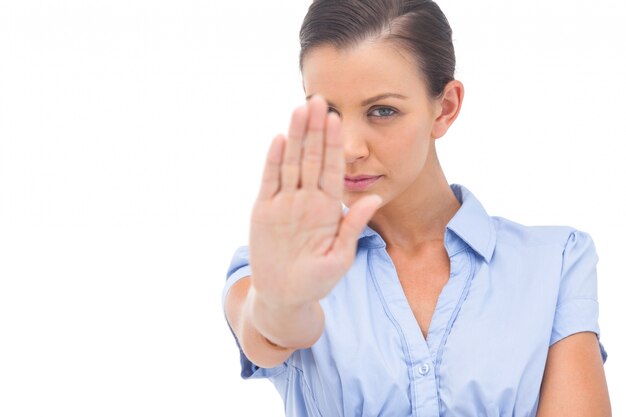 Photo businesswoman saying stop with hand