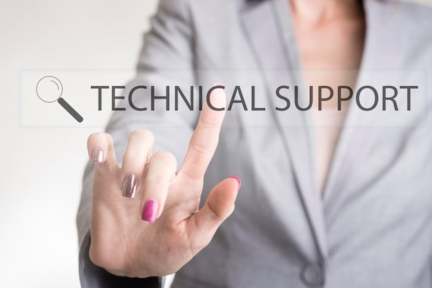 Businesswoman searching for a technical support on a virtual screen