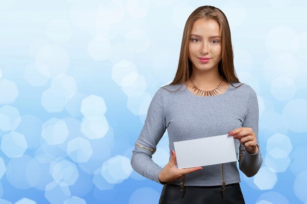 Businesswoman showing blank card