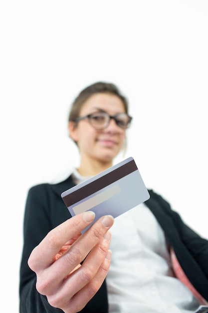 Businesswoman showing her credit card