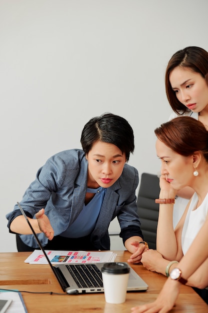 Businesswoman showing online project