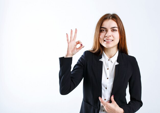 Businesswoman Shows OK Sign