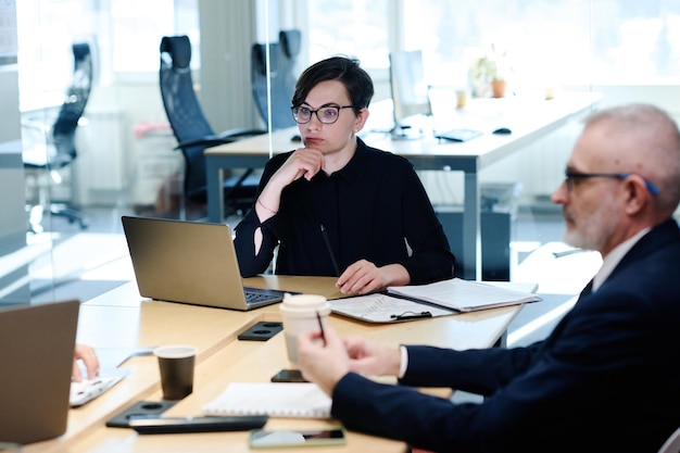 Businesswoman sitting at meeting at office