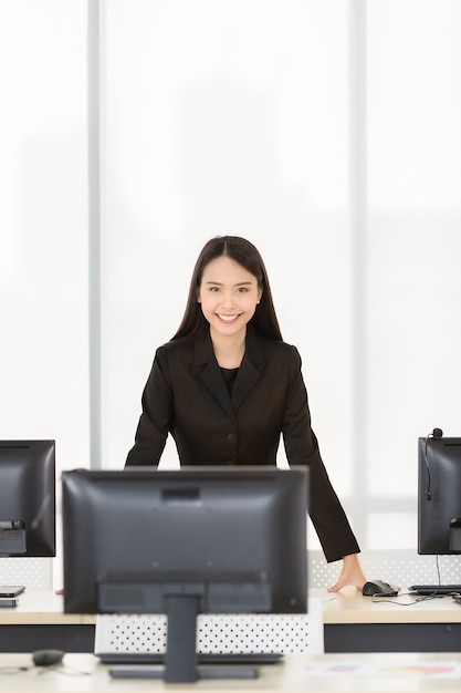 Businesswoman standing and smiling