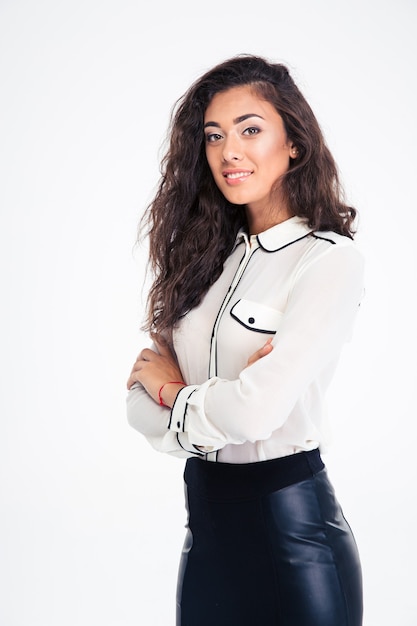 Businesswoman standing with arms folded