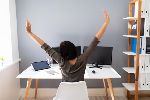 Businesswoman Stretching Her Arms