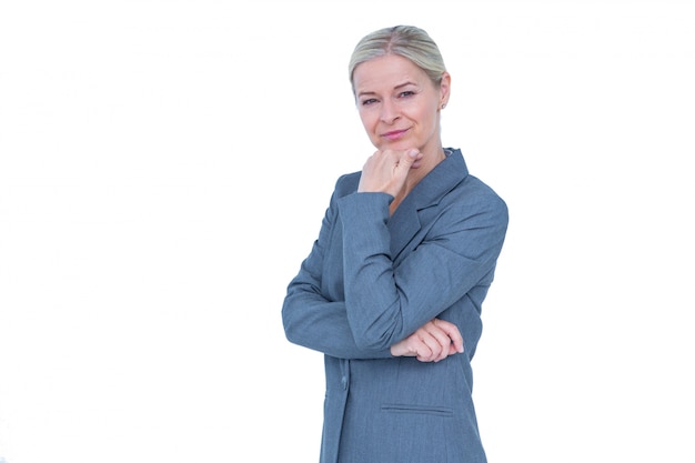 Businesswoman thinking with hand on chin