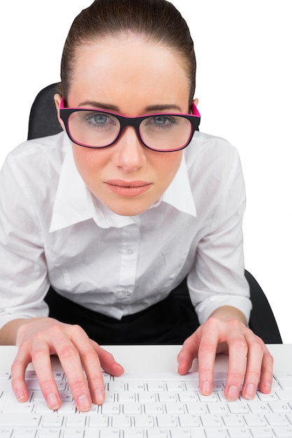 Businesswoman typing on a keyboard