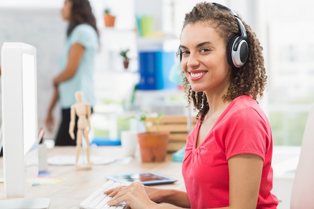 Businesswoman using computer in office