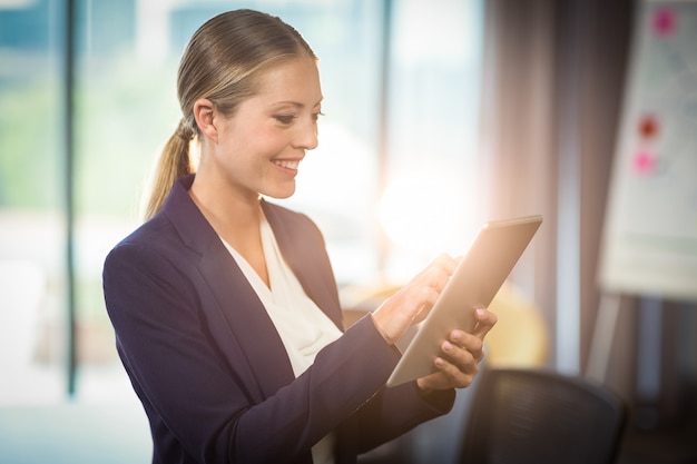 Businesswoman using digital tablet