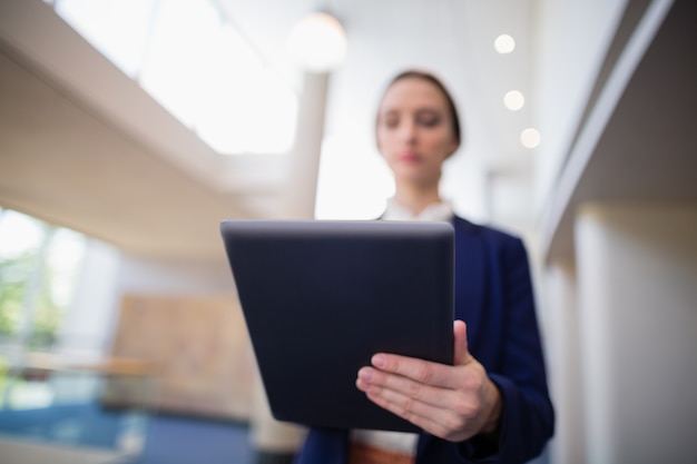 Businesswoman using digital tablet