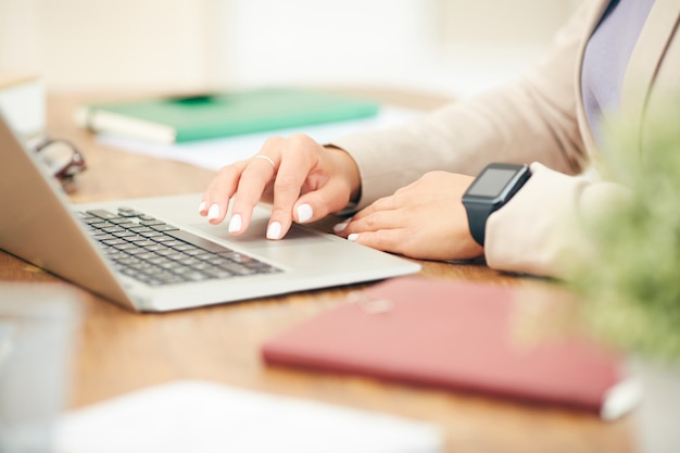 Businesswoman Using Laptop Closeup