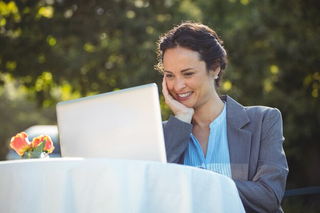 Businesswoman using laptop