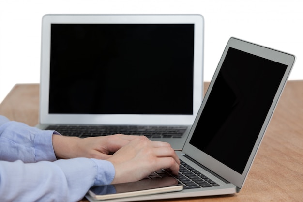 Businesswoman using laptop