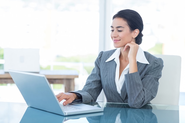 Businesswoman using laptop