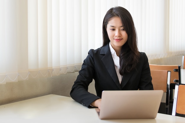 Businesswoman using  laptop