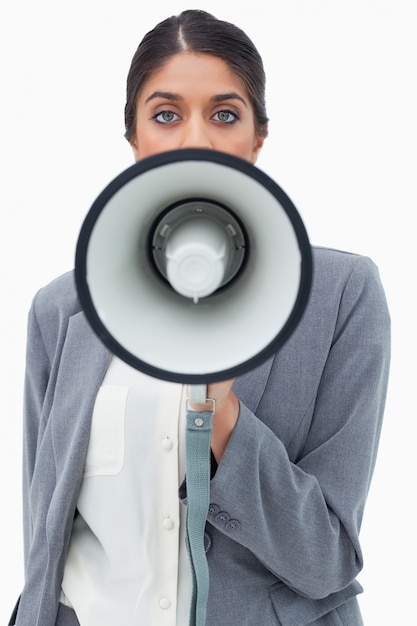 Businesswoman using megaphone