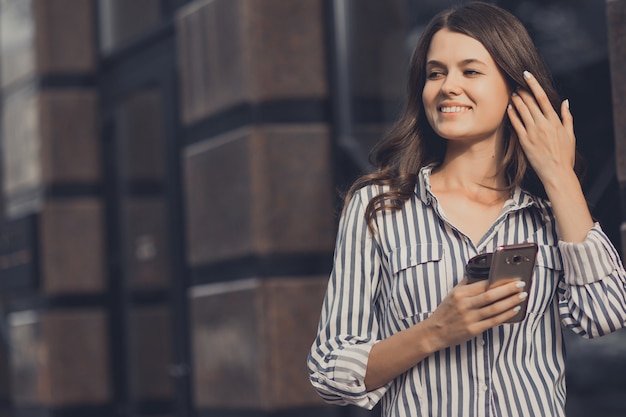 Businesswoman using a mobile phone