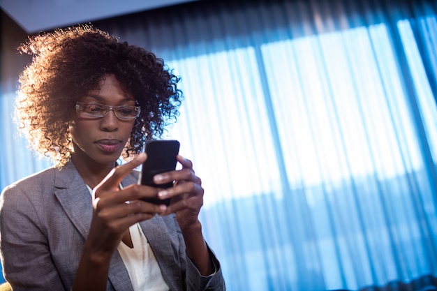 Businesswoman using a phone