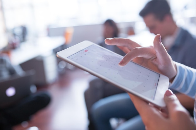 Businesswoman using tablet at the work in office