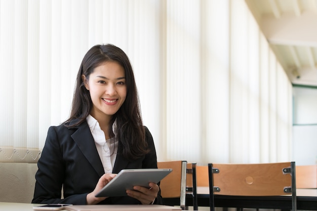 Businesswoman using the tablet